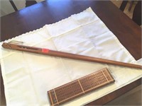 Walking stick and cribbage board
