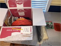 MISC BOX OF HARDWARE AND ORANGE EXTENSION CORD