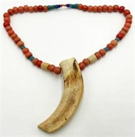 Coral Bead Necklace with Wild African Boar Tooth.