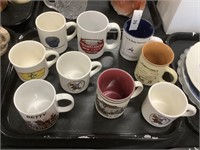 Assortment of coffee mugs.
