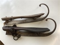 Vintage hand forged ice skates.