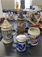 Set of Four Germany Steins.