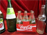 Lot of Glass Coca Cola 50/50 crush bottles.