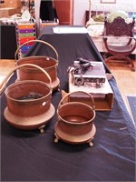Three copper and brass pots with brass