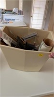 WASTE BASKET FULL OF BRUSHES AND OTHER ITEMS