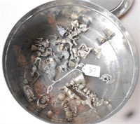 Container of small lead figures