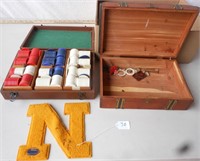 Container of poker chips and small cedar box