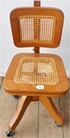 Oak cane bottom office chair, seat needs