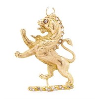 Antique diamond and yellow gold lion pendant
