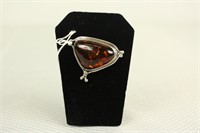 STERLING SILVER PIN SETTING WITH AMBER