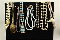 8 VINTAGE BEADED NECKLACES