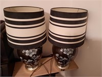Pair of black floral lamps