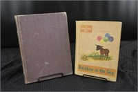2 First Edition Books. Rainbow In The Sky