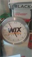 Wi-ex filters round battery operated clock