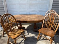 Oak table with two leafs and four chairs