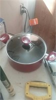 Red tefal stock pot with glass lid
