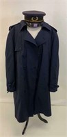 Military trench coat and George evans and co. hat