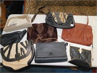 7 PURSES AND FANNY PACK MOSTLY USED