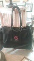Michael Kors black leather handbag