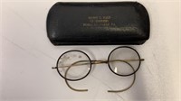 Glasses small round in Emery E Nale case