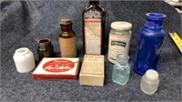 Vintage collection of medicine bottle and boxes