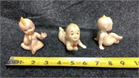 Set of 3 ceramic babies small chip on one *shown