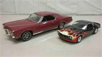Two Diecast Cars 1969 Pontiac Grand Prix & 1970