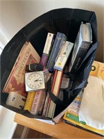 Box of books and clock