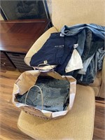 Assorted women’s jeans and shirts size 10