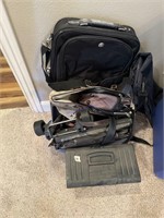 Assorted luggage and laptop cases