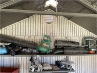 Two blowers and electric chainsaw contents of top