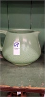 Green pottery pitcher