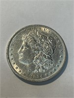 1884 p AU Grade Morgan Silver Dollar
