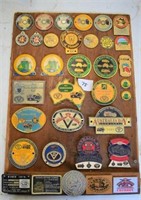 Board mounted with 35 Australian Motoring Badges