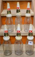 6 Oil bottles with plastic CX tops