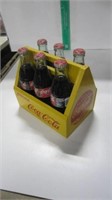 COCA COLA BOTTLES AND CARRIER