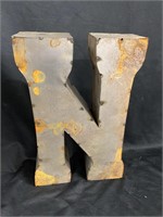 Metal capital N. They’re very popular. 14 inches