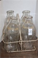 VINTAGE HALF GALLON MILK BOTTLES AND RACK