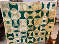 Antique handmade spool quilt