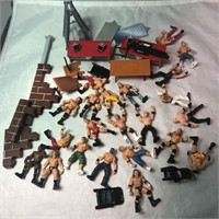 Lot of 22 WWE Mini Wrestlers and Accessories