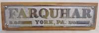 Farquhar plaque mounted on wood