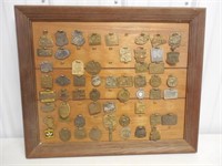 assorted lot of framed watch fobs