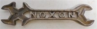 Noxon wrench with cut out letters