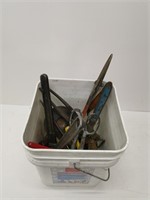bucket of tin snips, pliars, screwdrivers, etc.