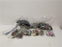 bag of misc items, key chains, pins, etc.