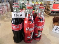 6 Vintage Coca Cola Bottles w/2 Mickey Mouse