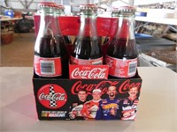 Vintage NASCAR Coca Cola Bottles in cardboard