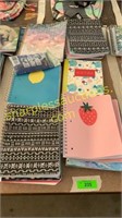 Lot of spiral notebooks