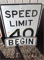 Begin & speed limit road signs