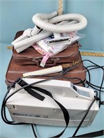 Oreck handheld vacuum, small luggage